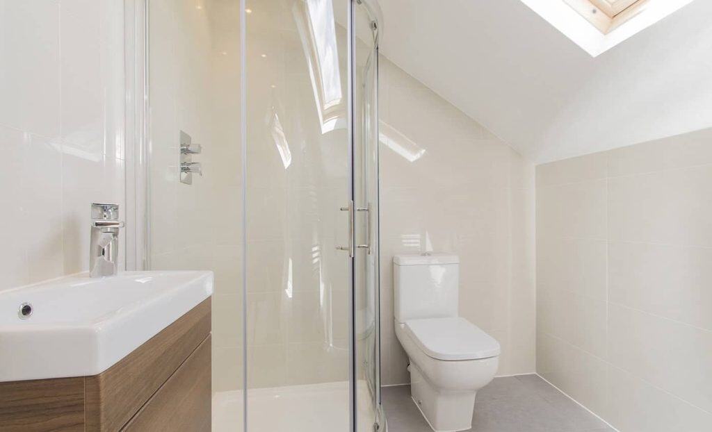 Acton Compact Modern Bathroom with Glass Shower and Skylight