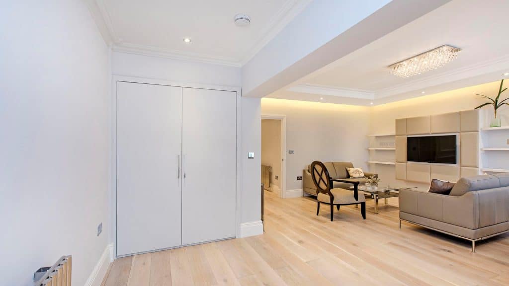 Gloucester Terrace Spacious hallway with built-in storage and bright lighting