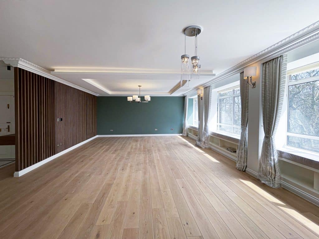 Spacious and modern living room in Hyde Park, natural lighting, and contemporary decor.